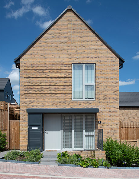 An external shot of a detached Keld home in the sun.